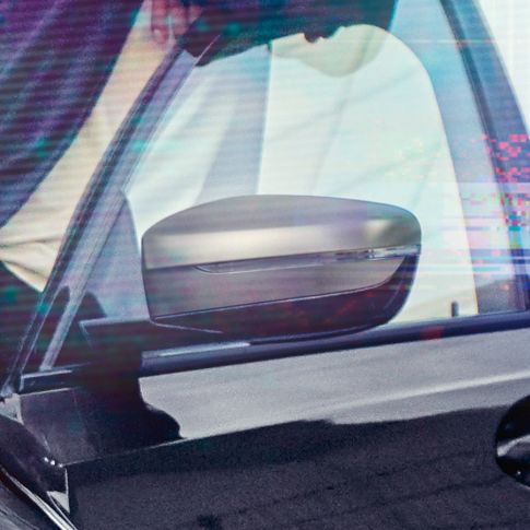 BMW 3 Series Sedan, mirror caps G20. Detail view of the open driver's door with mirror caps in Cerium grey metallic G20.