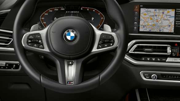 Автомобиль BMW X7 M со спортивной коробкой передач Steptronic Автомобиль BMW X7 M со спортивной коробкой передач Steptronic, G07, кокпит