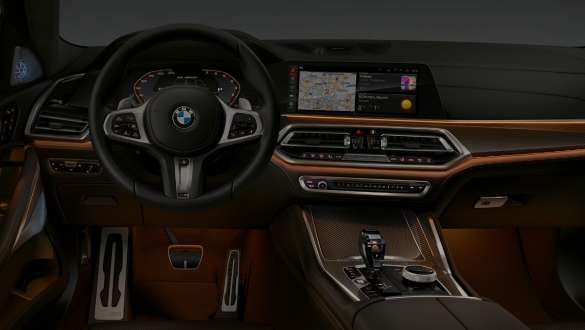 Кокпит с подсветкой Ambient light Кокпит BMW X6 с фокусировкой на дисплее 12,3″ и подсветке Ambient light