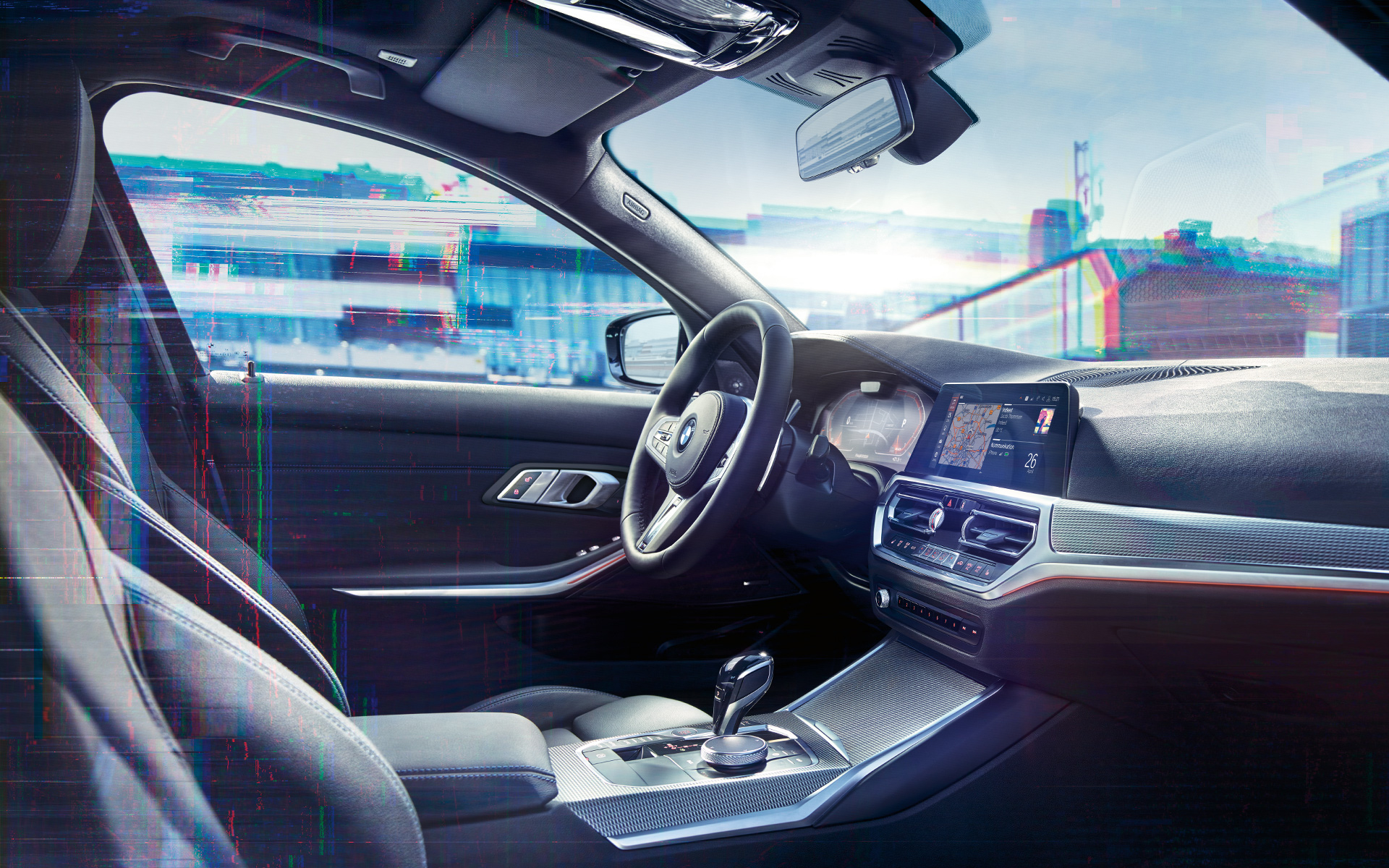 Крупный план салона BMW 3 серии (G20) с BMW Live Cockpit Professional.