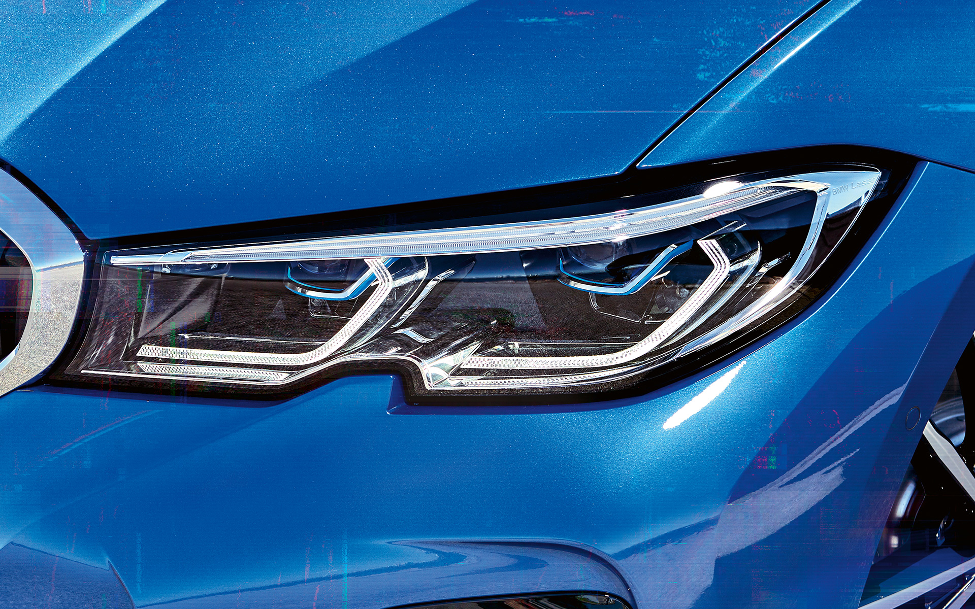BMW 3 серии (G20), лазерные фары BMW. Крупный план правой лазерной фары BMW.