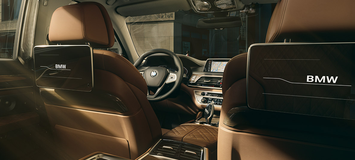 BMW 7 Series Sedan Rear-seat Entertainment BMW 7 Series Sedan: view from behind to the Rear-seat Entertainment with HD Touch Screens