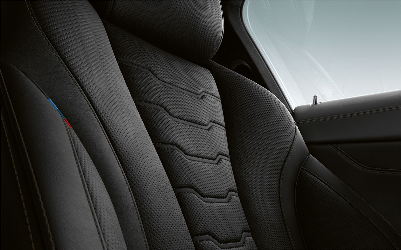 BMW 8 Series Coupé upholstery G15. Close-up of upholstery and stitching of the BMW 8 Series Coupé G15.
