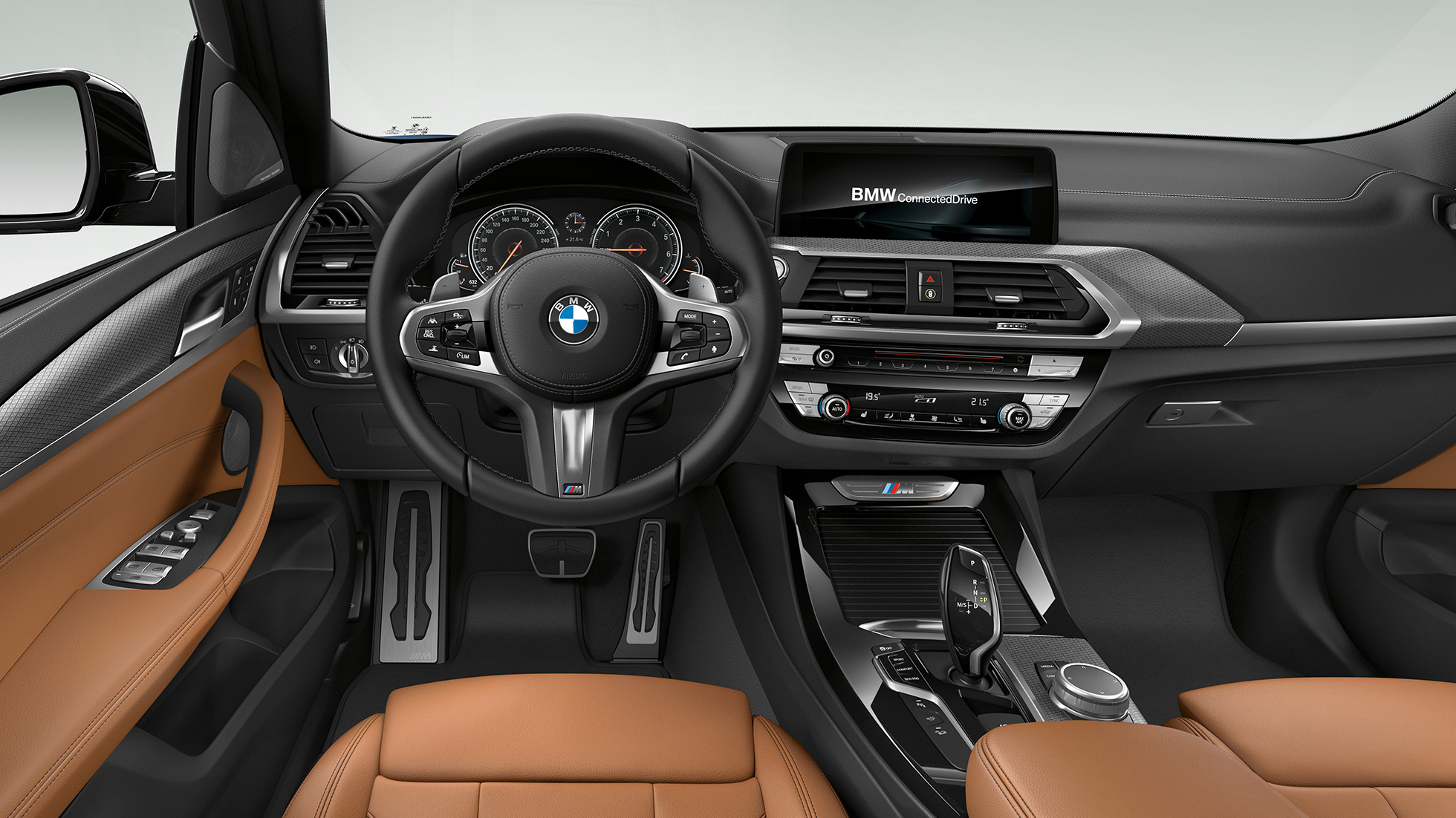 BMW X3 M40i и BMW X3 M40d, кокпит. BMW X3 M40i и BMW X3 M40d, салон, кокпит: обтянутое кожей рулевое колесо M и спортивные сиденья M.