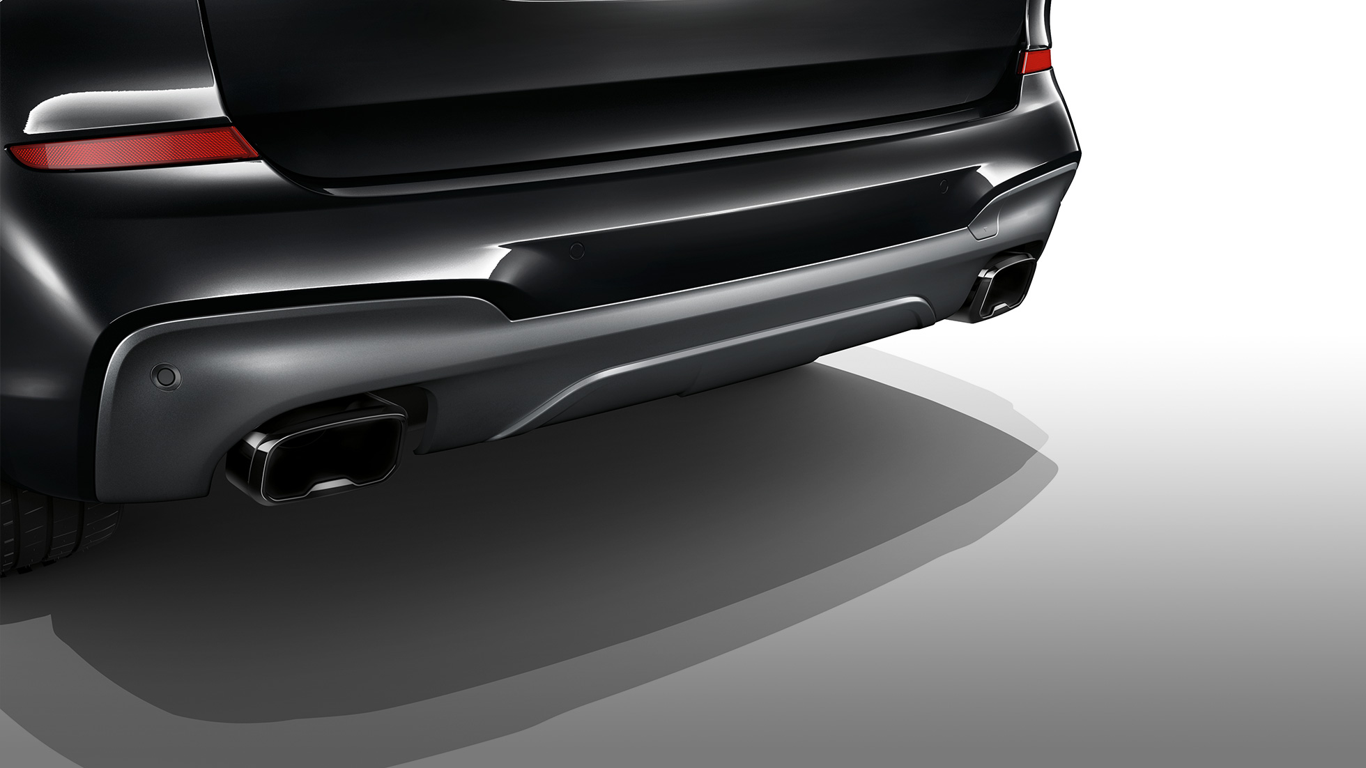 BMW X3 M40i и BMW X3 M40d, выхлопные патрубки. BMW X3 M40i и BMW X3 M40d, Черный Сапфир металлик, внешний вид, выхлопные патрубки в глянцевом черном исполнении.