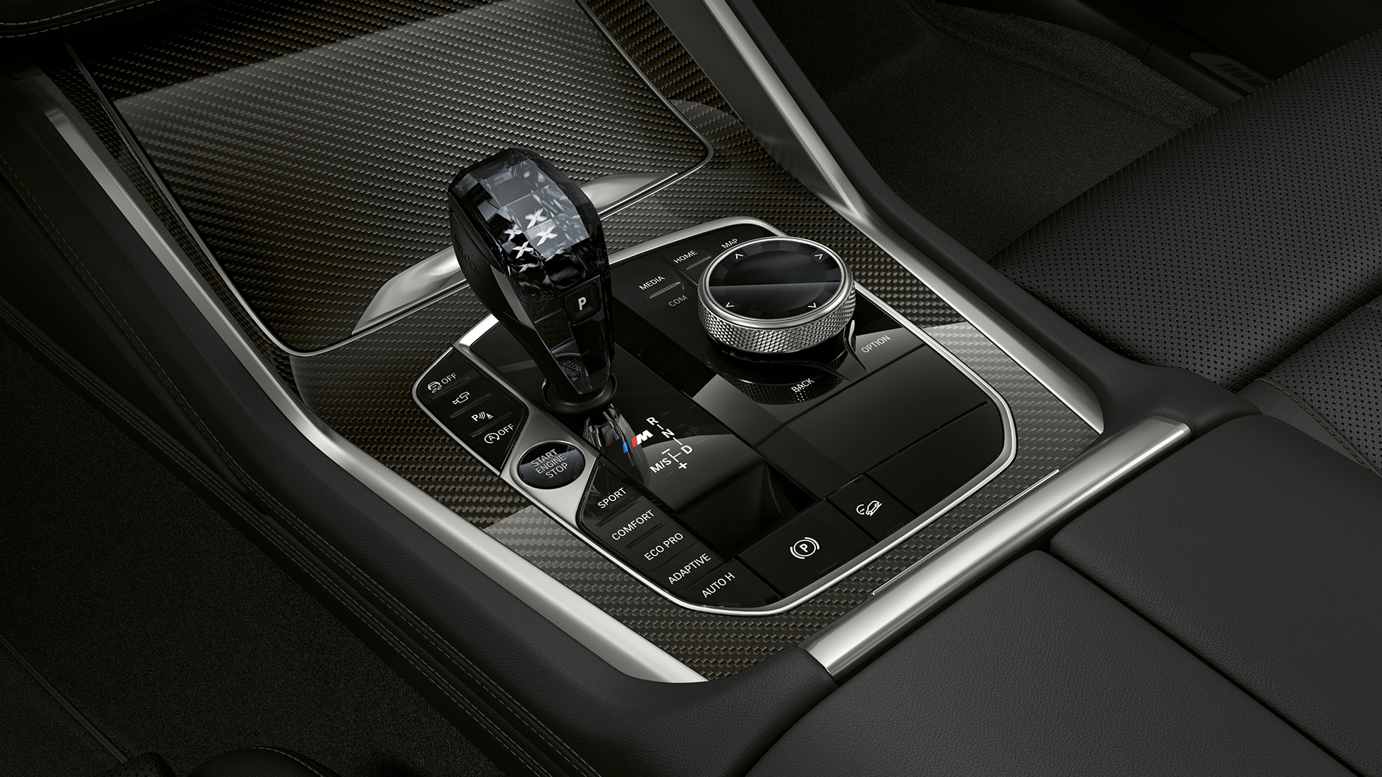 BMW X6 в версии BMW xLine, центральная консоль Интерьер BMW X6 в версии BMW xLine с фокусировкой на центральной консоли
