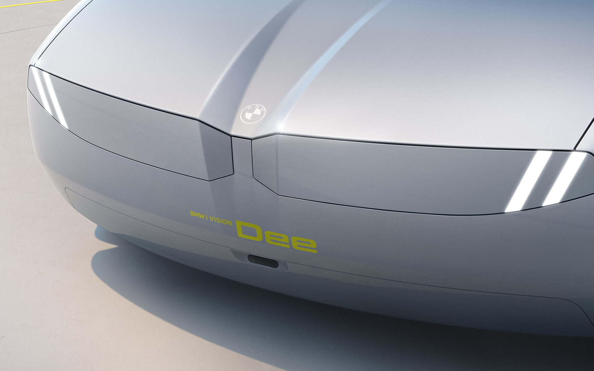 BMW i Vision Dee, концепт-кар, дизайн экстерьера, вид спереди Фары и решетка радиатора BMW образуют единую графическую поверхность.