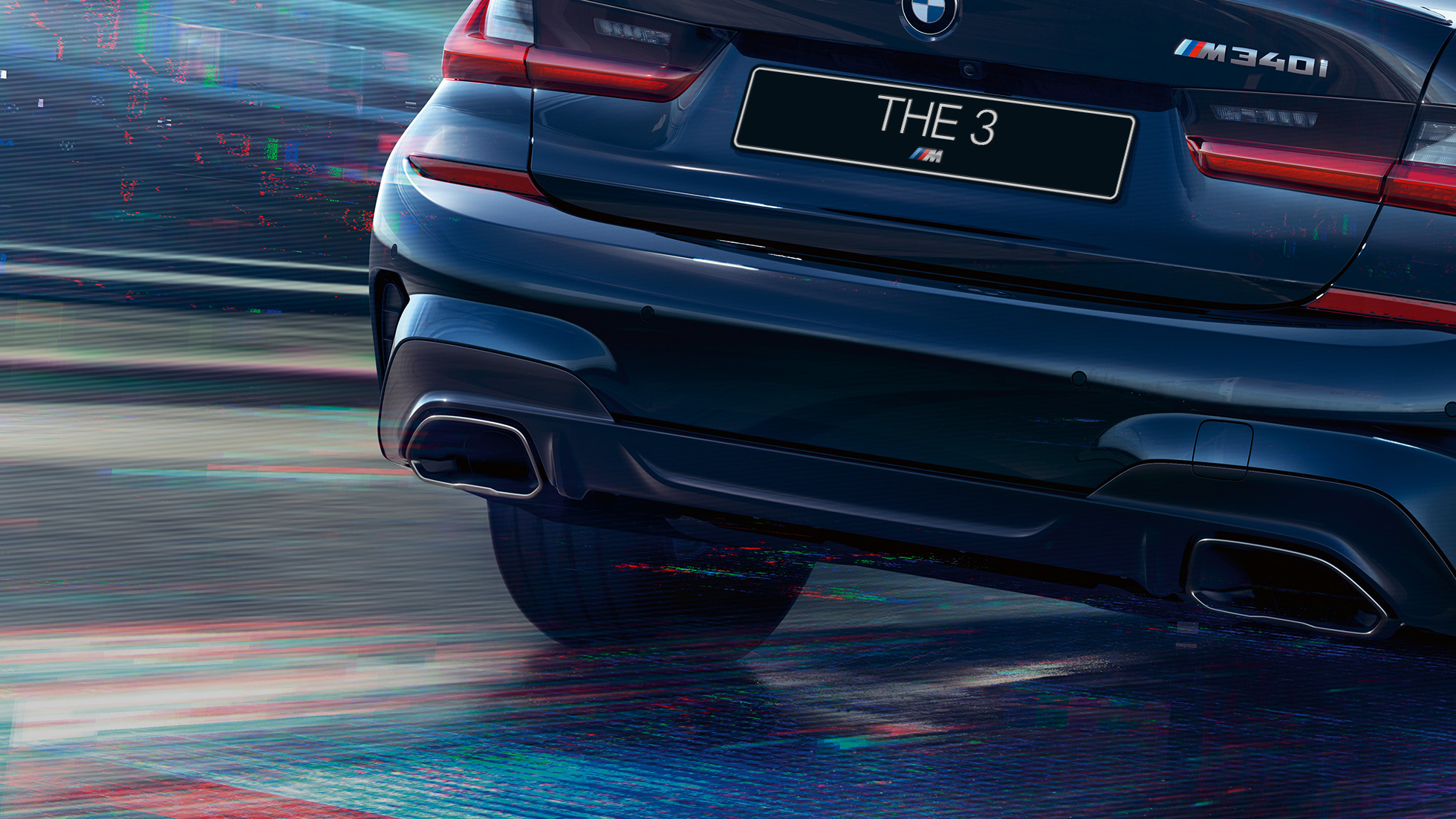 BMW 3 Series Sedan, M tailpipes. Close-up of the rear of the BMW 3 Series Sedan with M specific tailpipes in Cerium grey metallic.