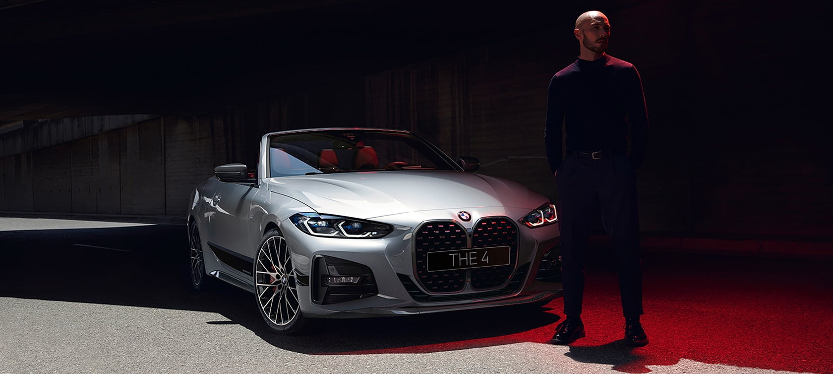 BMW 4 серии Cabrio G23 2020 "Зеленый Сан-Ремо металлик" с задним кронштейном для велосипедов BMW Pro 2.0, вид сзади в три четверти 