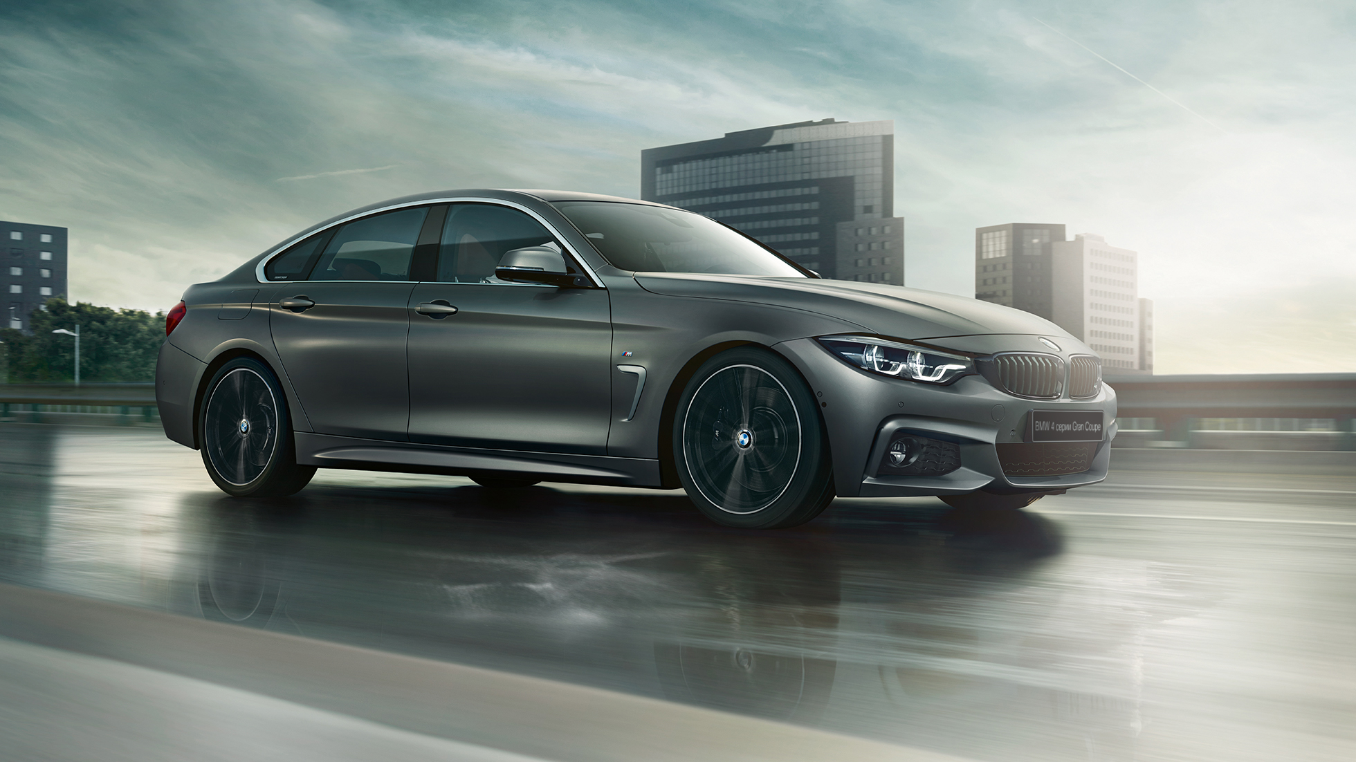 BMW 4 серии Гран Купе в движении BMW 4 серии Гран Купе в движении