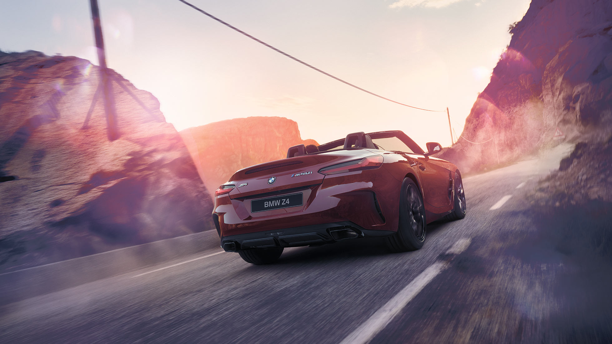 BMW Z4 Roadster, вид сзади BMW Z4 Roadster на сельской дороге, вид сзади