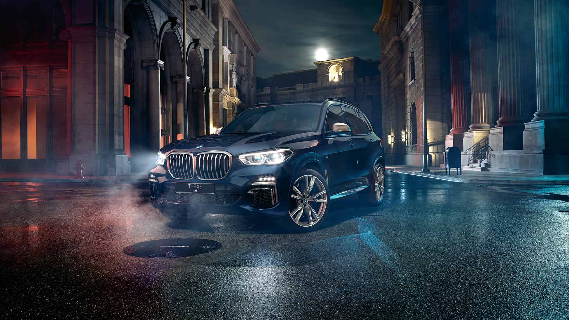 Фары BMW X5 M50i и M50d SUV G05 Фары X Laserlight BMW X5 M50i и M50d SUV G05 черного цвета Carbon (металлик), вид спереди с поворотом в три четверти