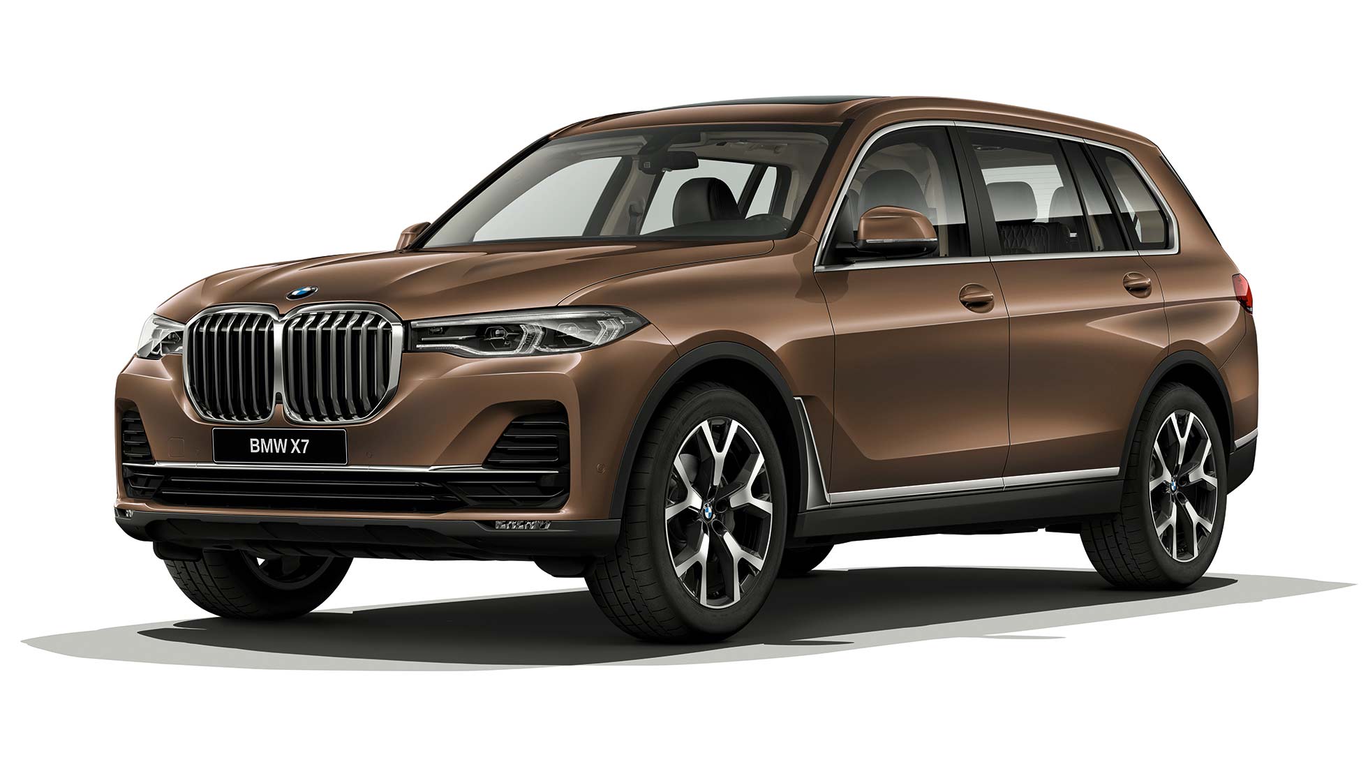 Стандартное оснащение BMW X7 Студийный снимок BMW X7 в бронзовом цвете Vermont, вид спереди с поворотом в три четверти