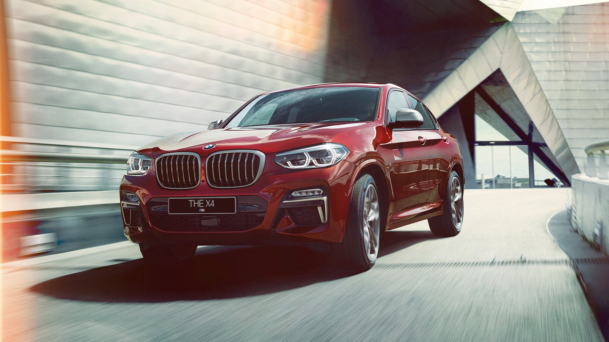 BMW X4 вид спереди в три четверти BMW X4 M40i G02 Flamenco Red brilliant, вид спереди в три четверти