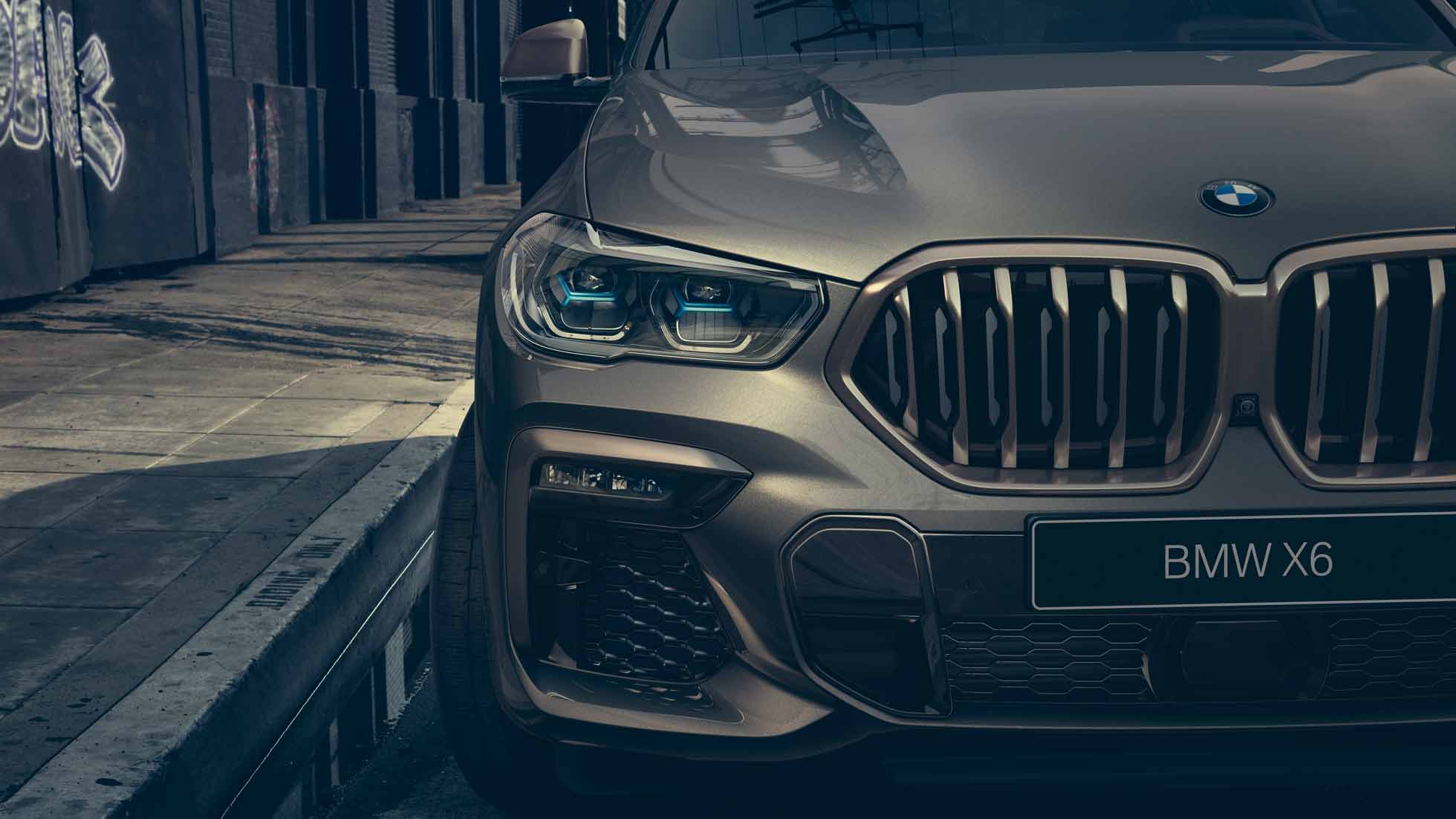 Крупный план BMW X6 с фокусировкой на лазерные фары BMW Laserlight