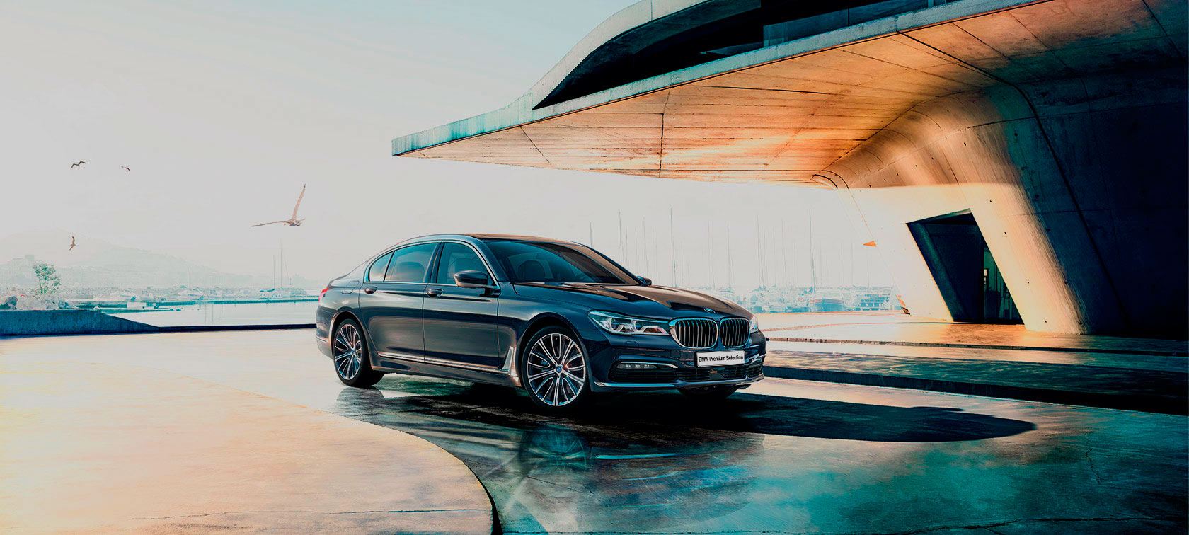 BMW 7 серии по программе Premium Selection. BMW 7 серии, вид спереди с поворотом в три четверти, по программе Premium Selection, БМВ.